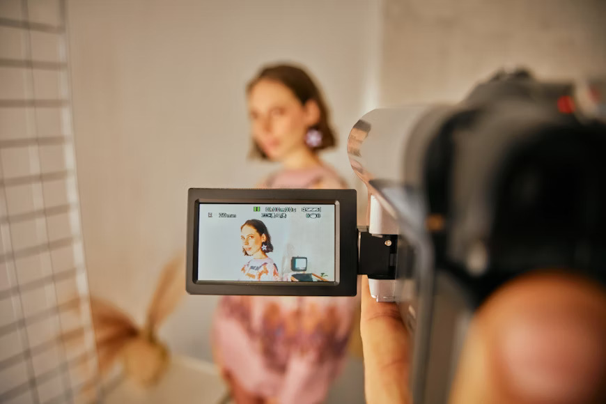 90s disposable camera style portrait with warm tone and flashy contrast