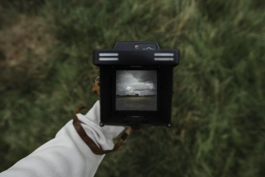 Portrait with classic digicam grain, mild JPEG texture and subtle vignette